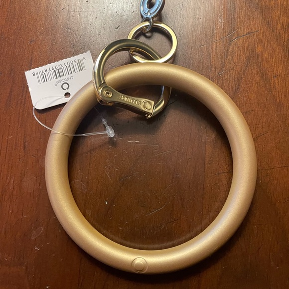 Oventure key ring, NWT.  Gold silicone. - Picture 1 of 2